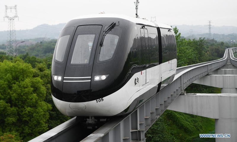 Passengers enter No.1 Subway Station to take SkyShuttle in Bishan District, southwest China's Chongqing Municipality, on April 16, 2021. Photo: Xinhua
