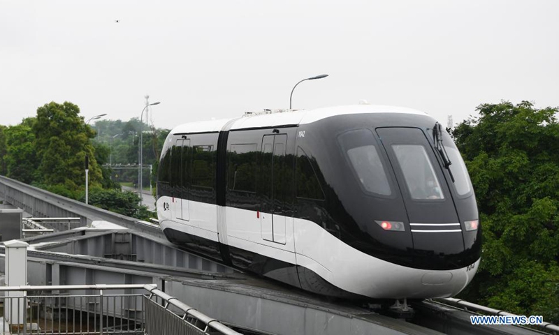 Passengers enter No.1 Subway Station to take SkyShuttle in Bishan District, southwest China's Chongqing Municipality, on April 16, 2021. Photo: Xinhua