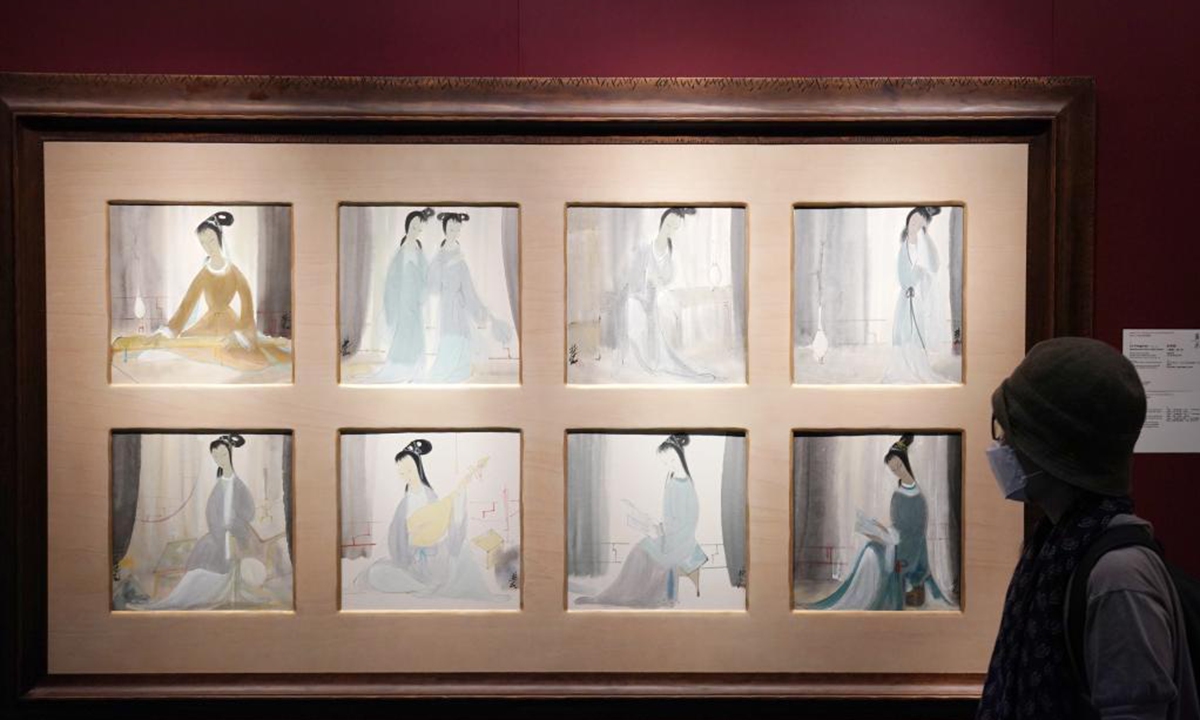 A visitor views items of the China Guardian Hong Kong 2021 Spring Auctions at Hong Kong Convention and Exhibition Center in Hong Kong, south China, April 18, 2021. About 1,300 items are on offer at the China Guardian Hong Kong 2021 Spring Auctions which is open from April 18 to 23. (Xinhua/Li Gang)