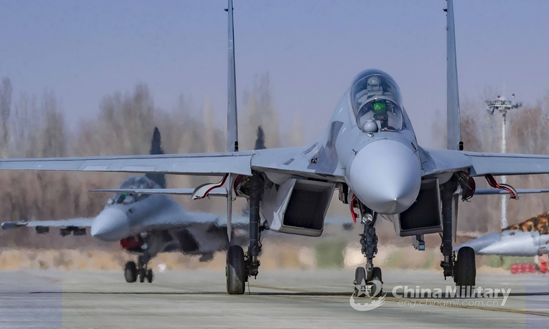 J-16 fighter jets attached to an aviation brigade of the air force under the PLA Western Theater Command taxi on the runway during an aerial combat training exercise under complex electromagnetic conditions in early April, 2021.(Photo: eng.chinamil.com.cn)