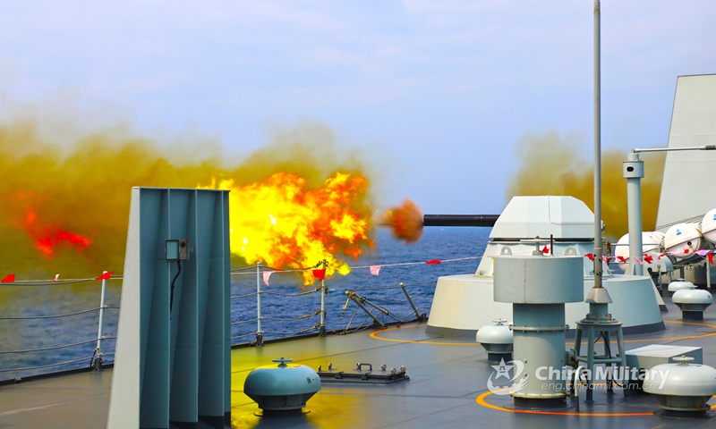 Warship attached to a naval landing ship flotilla under the PLA Southern Theater Command fires its auxiliary gun at mock sea targets during a maritime training exercise on March 27, 2021.(Photo: eng.chinamil.com.cn)