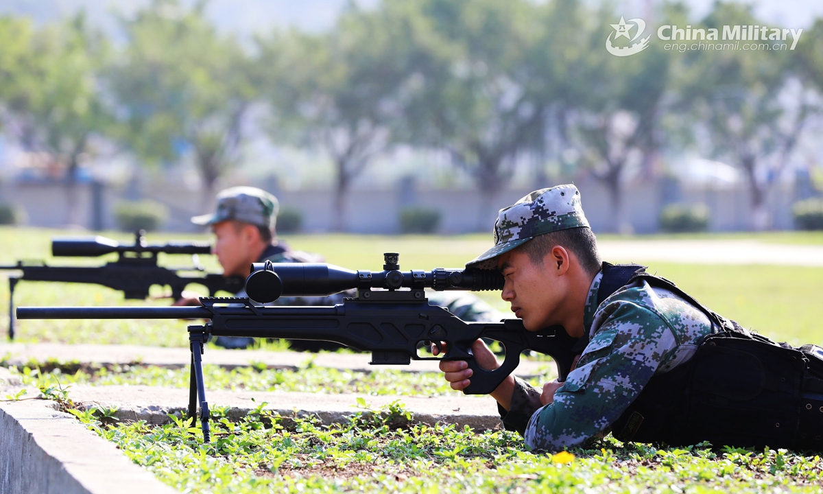 Members of a special operations force assigned to the PLA Macao Garrison participate in a comprehensive combat capability assessment,in order to check the combat capabilities of its special operations forces on coordination, skills and tactics on Apr 18, 2021.   Photo: China Military Online