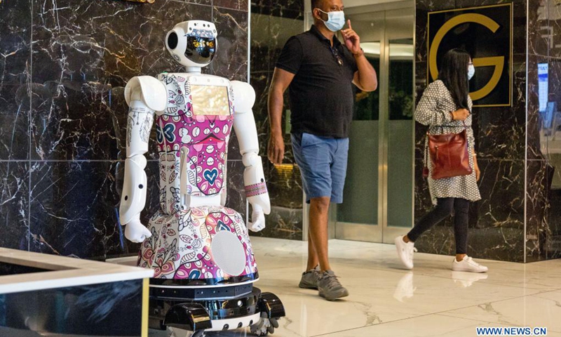 Service robot named Lexi welcomes dwellers at the lobby of Sky Hotel in Johannesburg, South Africa, on April 19, 2021. Lexi was introduced to provide non-contact services to hotel dwellers in response to the on-going COVID-19 pandemic.(Photo: Xinhua)