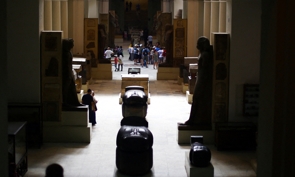 People explore Egypt’s new National Museum of Egyptian Civilization in Cairo, Egypt on Friday. Photo: AFP