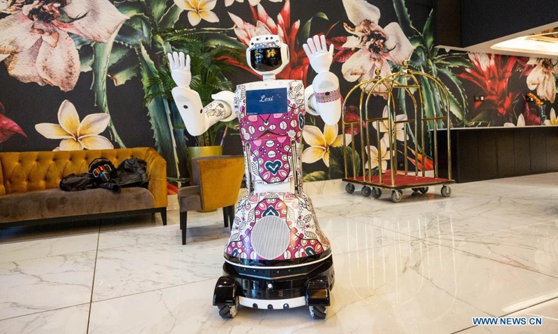 Service robot named Lexi welcomes dwellers at the lobby of Sky Hotel in Johannesburg, South Africa, on April 19, 2021. Lexi was introduced to provide non-contact services to hotel dwellers in response to the on-going COVID-19 pandemic.(Photo: Xinhua)