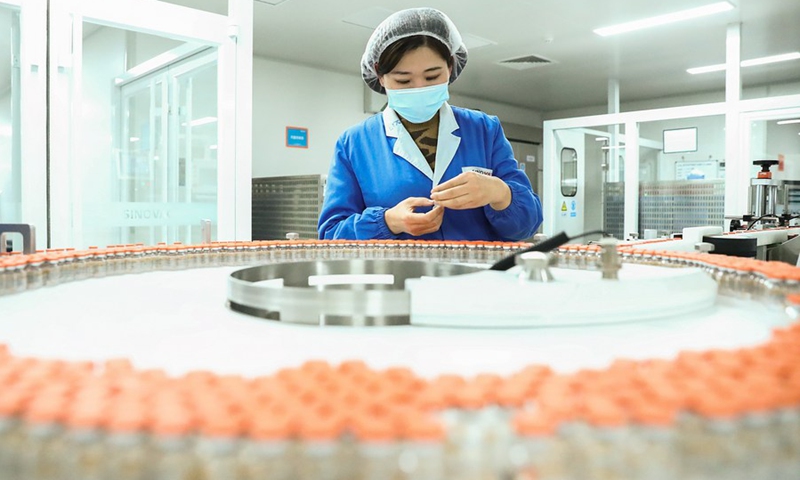 Photo taken on Dec. 23, 2020 shows the packing line for inactivated COVID-19 vaccine of Sinovac Biotech, a Chinese biopharmaceutical company, in Beijing, capital of China.(Photo: Xinhua)