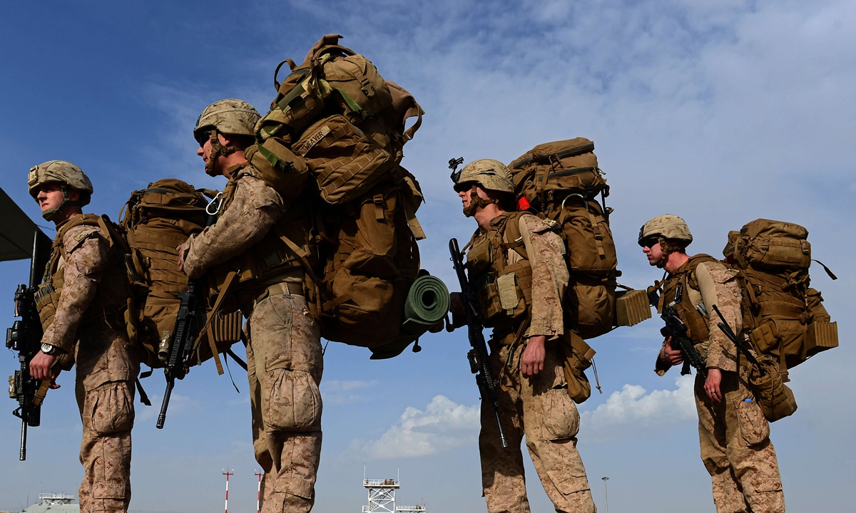 US Marines head to Kandahar as Britis h and US forces withdraw from the Camp Bastion-Leatherneck complex in Lashkar Gah in Helmand province on October 27, 2014. Photo: VCG
