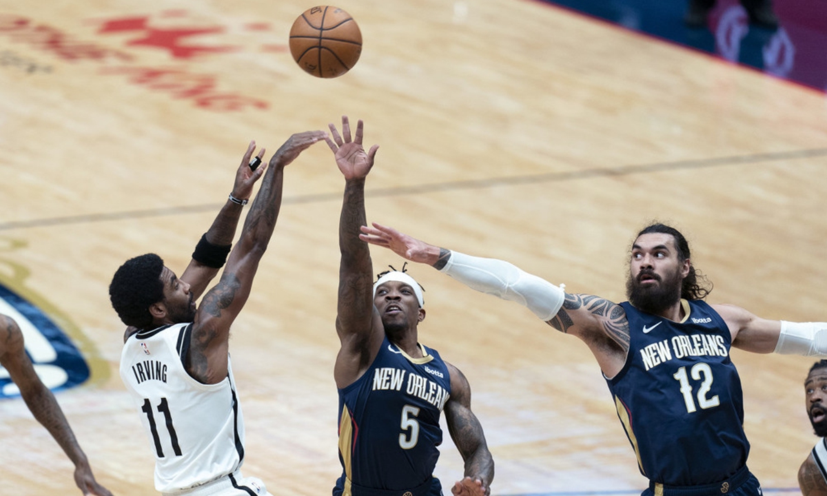 Brooklyn Nets' Kyrie Irving (No.11) shoots against the New Orleans Pelicans on Tuesday in New Orleans. Photo: IC