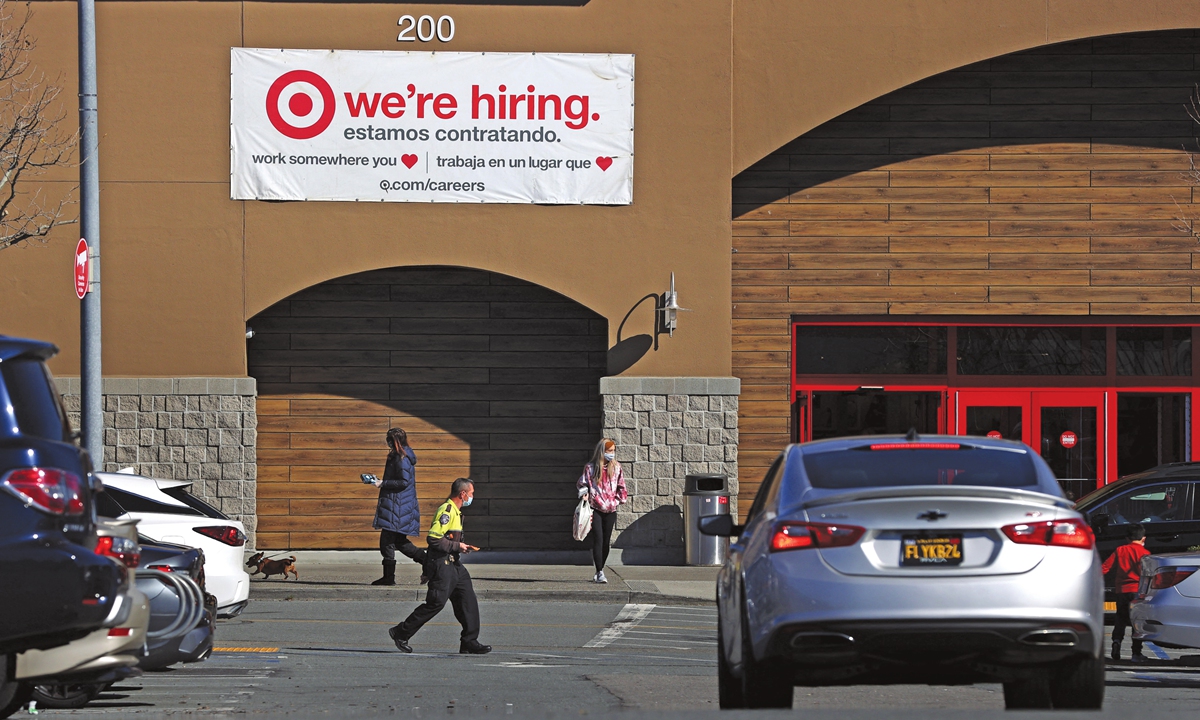 A hiring sign is displayed on the exterior of a Target store in Novato, California, the US on February 5. Photo: AFP