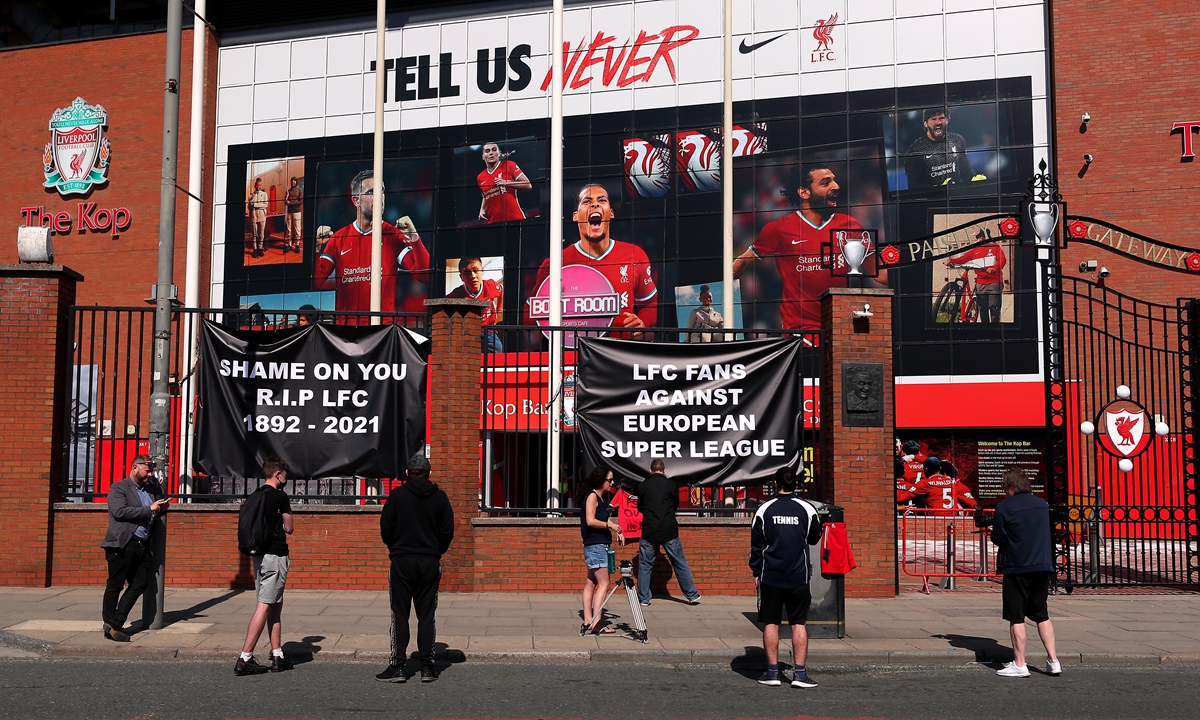 Banners are placed outside of Anfield, home of Liverpool, to protest against the club's decision to be included in the  European Super League. Photo: VCG