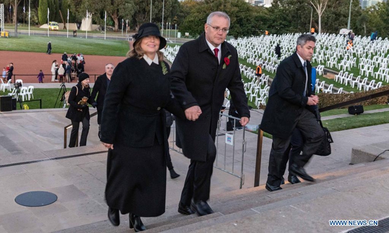 Australian Prime Minister Scott Morrison (R, front) and his wife attend an event marking the Anzac Day at Australian War Memorial in Canberra, Australia, April 25, 2021.(Photo:Xinhua)