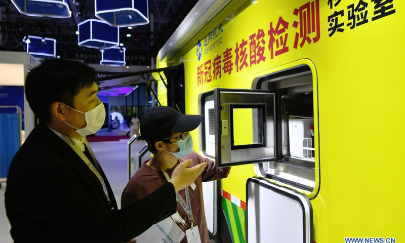 A high-tech company displays a mobile lab for COVID-19 nucleic acid testing at the digital achievements exhibition during the fourth Digital China Summit in Fuzhou, southeast China's Fujian Province, April 25, 2021.(Photo: Xinhua)