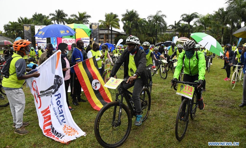 Participants ride bicycles during an activity to mark the World Malaria Day in Kampala, Uganda, April 25, 2021. As the world commemorated World Malaria Day on Sunday, dozens of riders in Uganda, including young and old, rode over 30 km to raise awareness against the disease.(Photo: Xinhua)