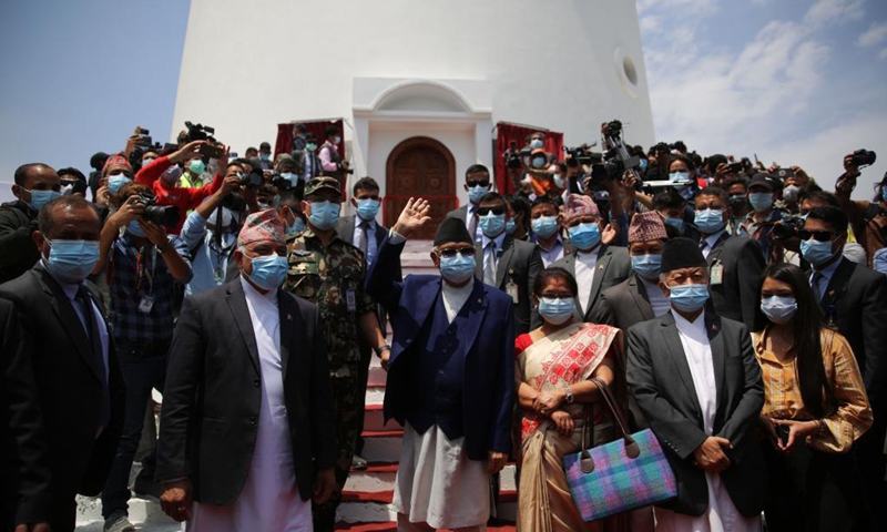 Nepal's Prime Minister KP Sharma Oli (C) attends the inauguration of the newly-built Dharahara in Kathmandu, Nepal, April 24, 2021. Located in Kathmandu and built in 1832, the nine-storey Dharahara Tower is part of the city's historical architecture recognized by UNESCO. Most of the tower collapsed on April 25, 2015 during the massive earthquake although the base remains. The reconstruction work started in 2018 and the newly-built Dharahara was inaugurated on April 24.(Photo: Xinhua)