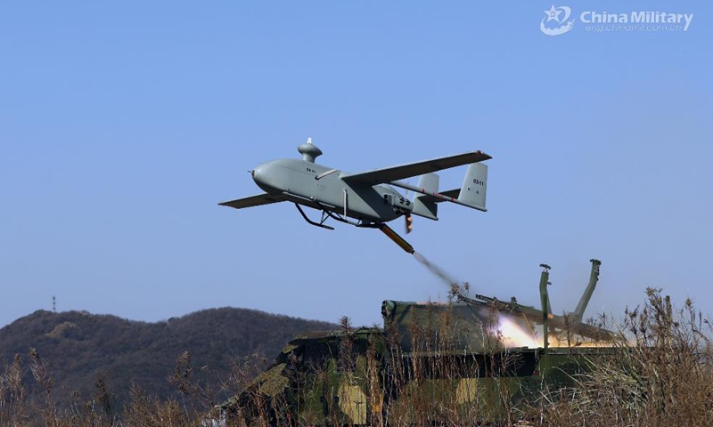 A drone attached to a female UAV detachment under the PLA 72nd Group Army takes off during an actual combat training exercise in early April, 2021. The training involved such items as emergency flight preparation, reconnaissance and confrontation of the drones under high altitude and adverse weather conditions in strange areas. (eng.chinamil.com.cn/Photo by Huang Baochuan and Zhang Linyu)