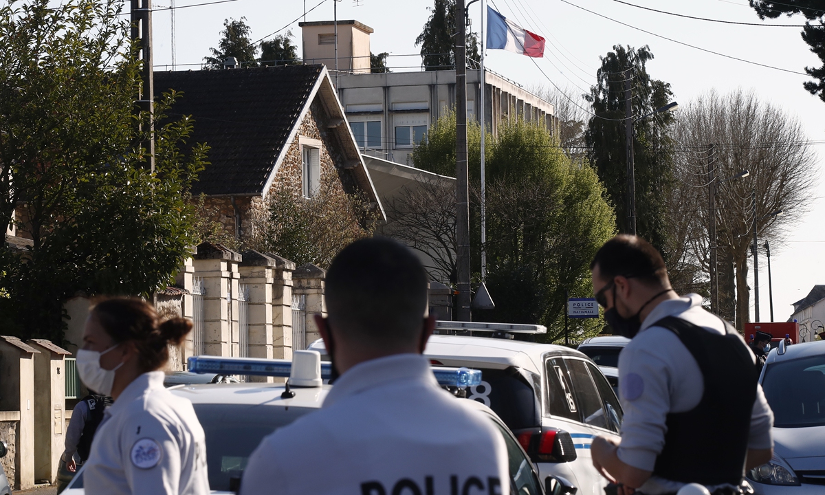 French Police officers stand next to the Police station in Rambouillet, south west of Paris, Friday, April 23, 2021. Photo: VCG