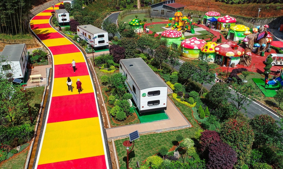 A camping complex project of recreational vehicles (RVs) opens to the public on Thursday in a county in Yibin, Southwest China's Sichuan Province. The county has actively promoted integrated development of leisure and sightseeing agriculture and rural tourism to implement the national strategy of rural revitalization. Photo: cnsphoto