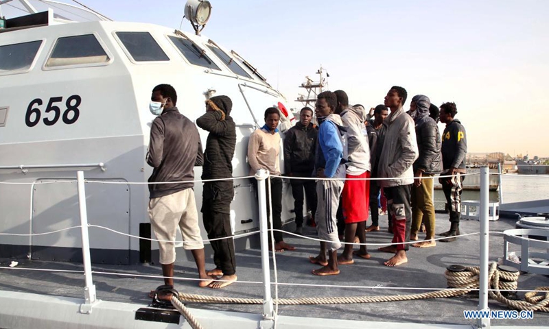 Illegal immigrants are seen on the deck of a Libyan Coast Guard's ship in Tripoli, Libya, on April 29, 2021. Photo:Xinhua