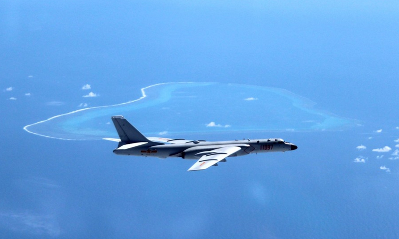 File photo taken in July, 2016 shows Chinese H-6K bomber patrolling islands and reefs including Huangyan Island in the South China Sea. (Xinhua/Liu Rui)