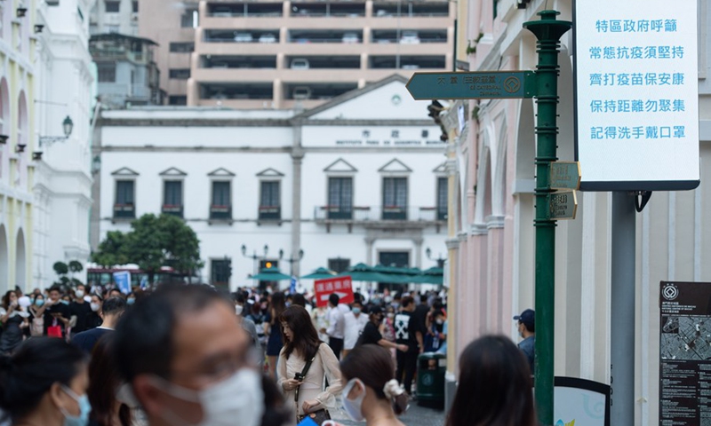 Tourists visit the Senado Square in south China's Macao, on May 3, 2021, the third day of China's five-day May Day holiday. (Xinhua/Cheong Kam Ka)
