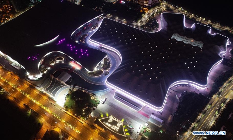 Aerial photo taken on May 4, 2021 shows Hainan International Convention and Exhibition Center at night in Haikou, capital of south China's Hainan Province. Haikou, an important city of China's Belt and Road initiative and also a core city for the construction of free trade port in Hainan Province, will greet the first China International Consumer Products Expo. Photo: Xinhua