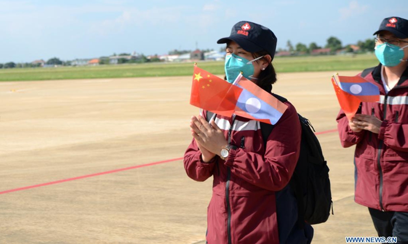A team of Chinese medical experts, along with medical materials, arrives at the Wattay International Airport in Vientiane, Laos, May 4, 2021, to assist Laos in fighting the COVID-19 pandemic.(Photo: Xinhua)