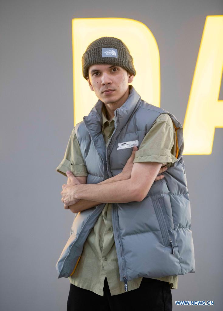 Xirli Abdukirm poses for a photo at a street dance studio in Urumqi, northwest China's Xinjiang Uygur Autonomous Region, April 21, 2021.(Photo: Xinhua)