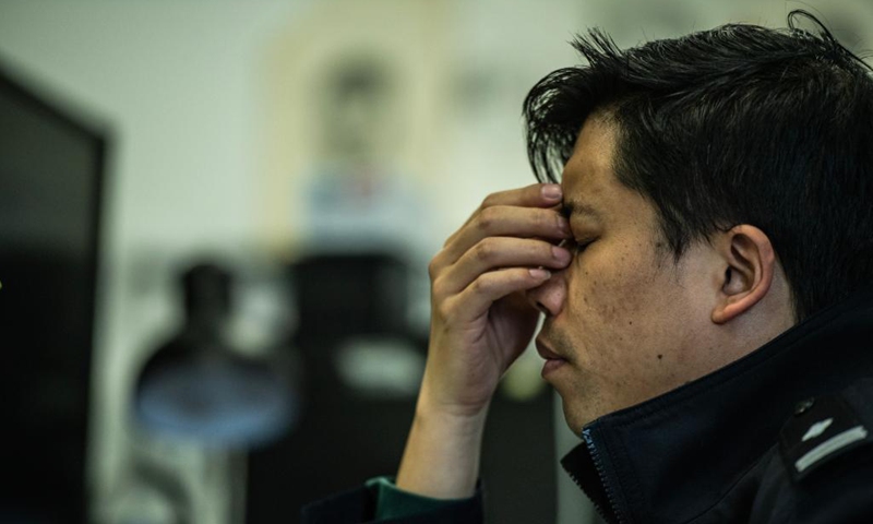 Zhu Yunhong conceives the image of a possible suspect at large in his office at the criminal detective division of the Guiyang Public Security Bureau in Guiyang, southwest China's Guizhou Province, May 2, 2021.(Photo: Xinhua)
