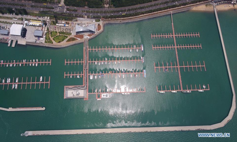 Aerial photo taken on April 30, 2021 shows the Haikou National Sailing Base Public Wharf, where the yacht show of the first China International Consumer Products Expo will be held, in Haikou, capital of south China's Hainan Province. Haikou, an important city of China's Belt and Road initiative and also a core city for the construction of free trade port in Hainan Province, will greet the first China International Consumer Products Expo.  Photo: Xinhua