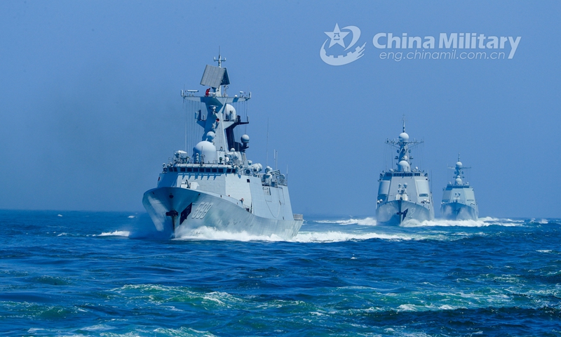 Warships attached to a destroyer flotilla with the navy under the PLA Eastern Theater Command steam in astern formation in waters of the East China Sea during the realistic training on April 23, 2021.  Photo: China Military Online