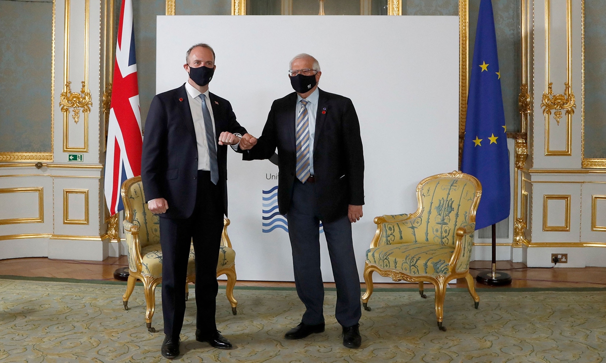 Britain's Foreign Secretary Dominic Raab (L) and European High Representative of the Union for Foreign Affairs Josep Borrell pose for a photograph during the G7 foreign ministers meeting in London on May 5, 2021. Photo: VCG