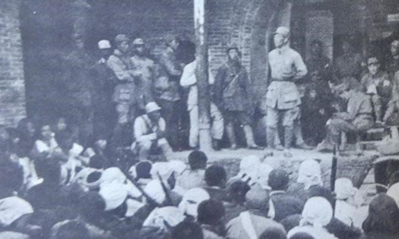 Explaining the war situation to the local people