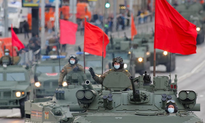 Soldiers are seen on military vehicles before a rehearsal of the Victory Day parade in Moscow, Russia, on May 4, 2021. Russia holds Victory Day parades in various cities on May 9.(Photo: Xinhua)