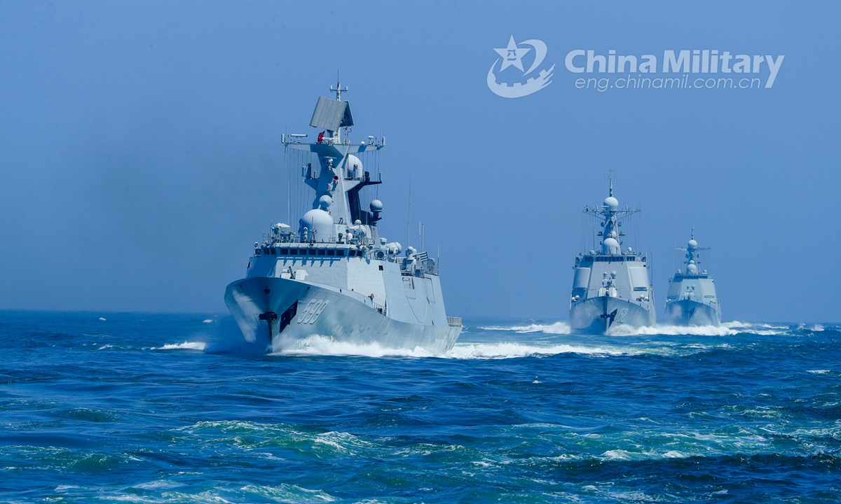 Warships attached to a destroyer flotilla with the navy under the PLA Eastern Theater Command steam in astern formation in waters of the East China Sea during the realistic training on April 23, 2021.Photo:China Military