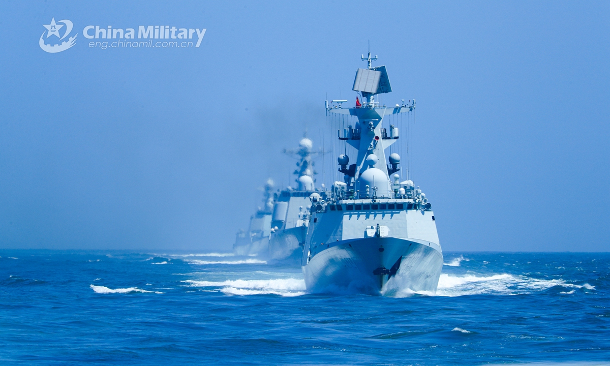 Warships attached to a destroyer flotilla with the navy under the PLA Eastern Theater Command steam in astern formation in waters of the East China Sea during the realistic training on April 23, 2021.Photo:China Military