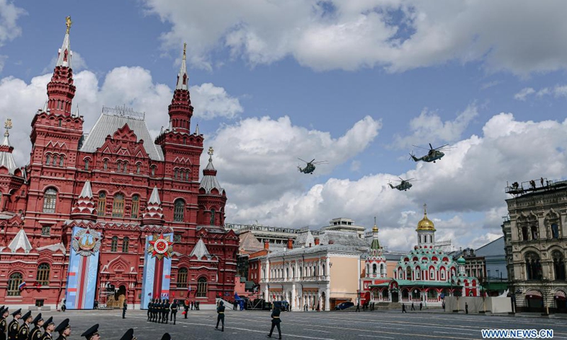 Helicopters fly over the Red Square during a rehearsal of the Victory Day parade in Moscow, Russia, May 7, 2021. Russia will hold military parades across the country to commemorate the 76th anniversary of the Soviet victory in the Great Patriotic War on May 9.Photo:Xinhua