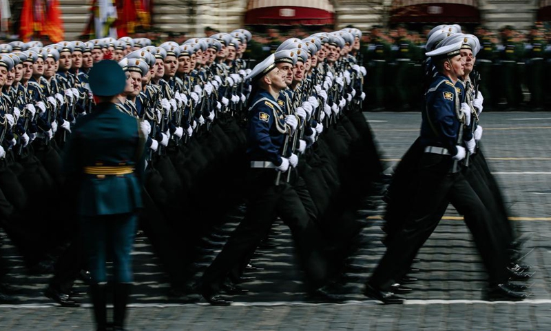 Servicemen march during a rehearsal of the Victory Day parade in Moscow, Russia, May 7, 2021. Russia will hold military parades across the country to commemorate the 76th anniversary of the Soviet victory in the Great Patriotic War on May 9.Photo:Xinhua