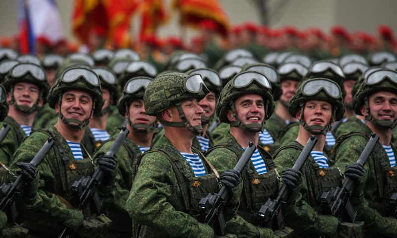 Servicemen march during the military parade marking the 76th anniversary of the Soviet victory in the Great Patriotic War, Russia's term for World War II, on Red Square in Moscow, Russia, May 9, 2021.   Photo: Xinhua
