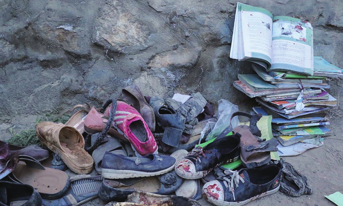 A view from the site, where mostly schoolgirls, have been killed in three back-to-back blasts targeting a school in Afghanistan's capital Kabul on Saturday Photo: AFP