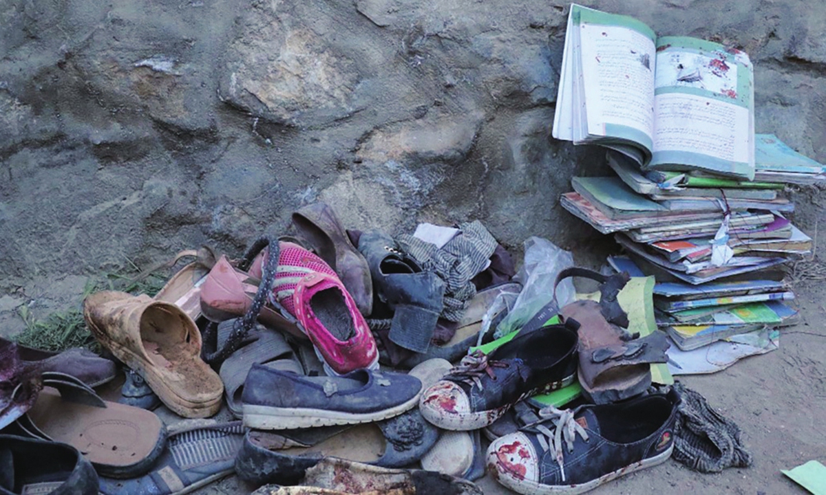 A view from the site, where mostly schoolgirls, have been killed in three back-to-back blasts targeting a school in Afghanistan's capital Kabul on Saturday Photo: AFP