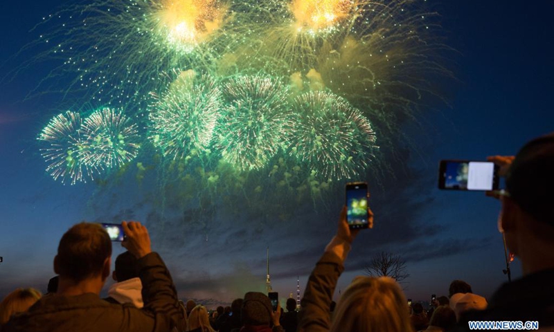 People watch fireworks commemorating the 76th anniversary of the victory in the Great Patriotic War in St. Petersburg, Russia, May 9, 2021.(Photo: Xinhua)