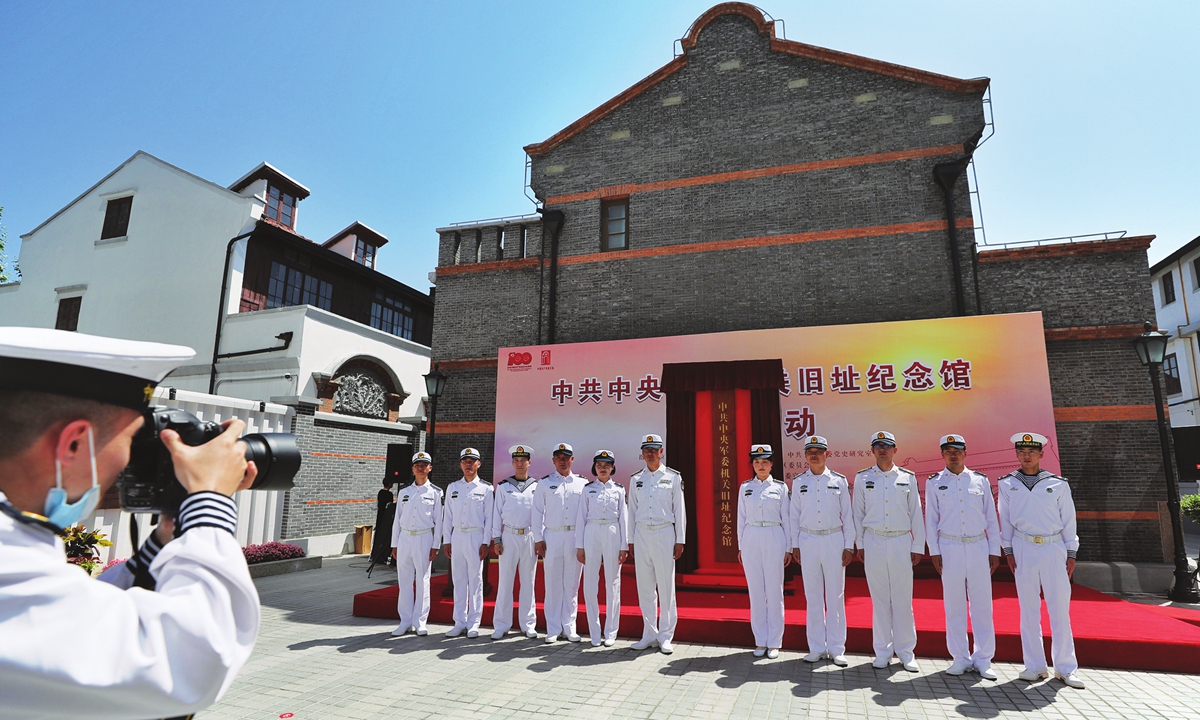 Service members pose for a photo at the memorial hall on the former site of the Central Military Commission of the Communist Party of China on Monday in Shanghai. After three years of preparation, the hall officially opened as an education and red tourism site. Photo: VCG
