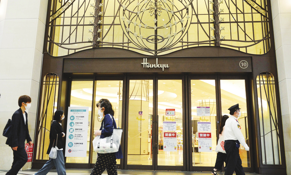 A department store temporarily closes in Osaka City, Osaka Prefecture, Japan on Tuesday, amid an epidemic of the new coronavirus. Japanese superstar Naomi Osaka admitted she was 