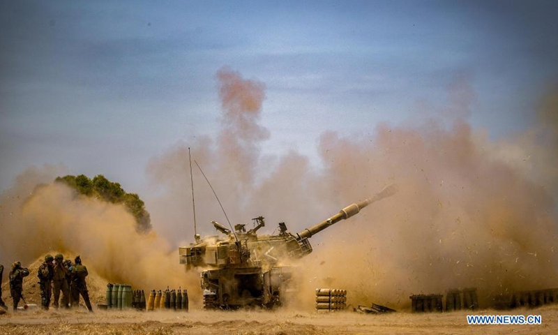 Israeli Artillery Corps fire into the Gaza Strip near the southern Israeli city of Sderot on May 12, 2021. At least 65 in Gaza and seven in Israel were killed by airstrikes and rockets, according to official reports. Photo: Xinhua