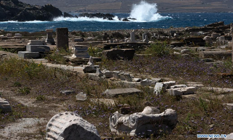 Part of the archaeological site of the island Delos is seen in Delos, Greece, on May 10, 2021. Delos, once a booming trading center in the middle of the Aegean Sea near Mykonos, is a UNESCO world heritage with a history of 5,000 years. It is one of the most important mythological, historical and archaeological sites in Greece.(Photo: Xinhua)