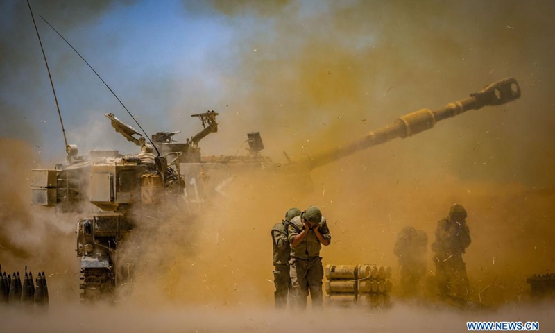 Israeli Artillery Corps fire into the Gaza Strip near the southern Israeli city of Sderot on May 12, 2021. At least 65 in Gaza and seven in Israel were killed by airstrikes and rockets, according to official reports. Photo: Xinhua