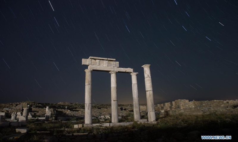Photo taken on May 9, 2021 shows the Establishment of the Poseidoniasts at night on the island of Delos, Greece. Delos, once a booming trading center in the middle of the Aegean Sea near Mykonos, is a UNESCO world heritage with a history of 5,000 years. It is one of the most important mythological, historical and archaeological sites in Greece.(Photo: Xinhua)