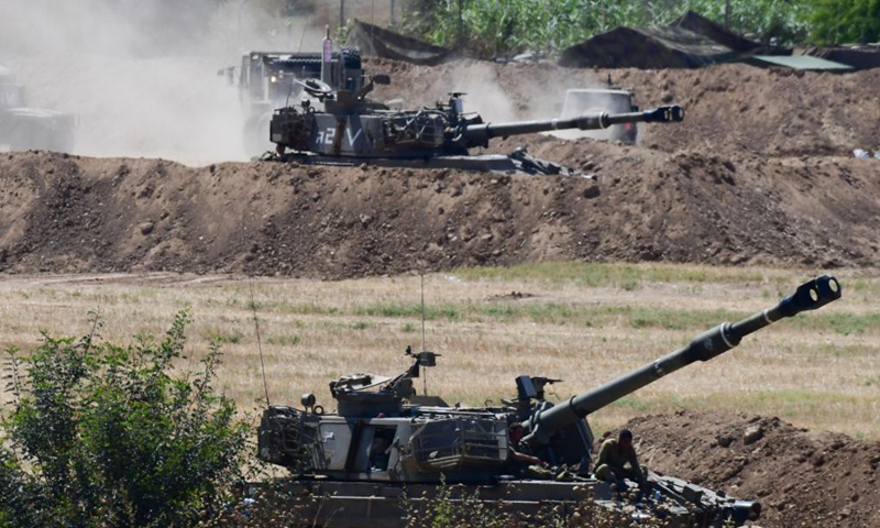 Israeli army artillery corps fire towards Gaza near the Israel-Gaza border near southern Israeli city of Sderot on May 16, 2021.(Photo: Xinhua)