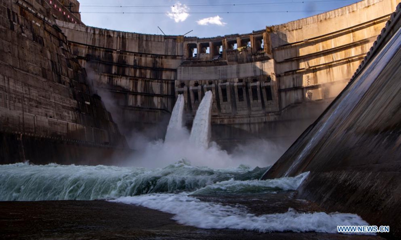 Aerial photo taken on May 13, 2021 shows the view of the Baihetan hydropower station under construction in southwest China. Baihetan on the Jinsha River, the upper section of the Yangtze, straddles the southwest provinces of Yunnan and Sichuan. With a total installed capacity of 16 million kilowatts, it is the second-largest hydropower station in China in terms of installed capacity, second only to the Three Gorges Dam project in the central province of Hubei.(Photo: Xinhua)