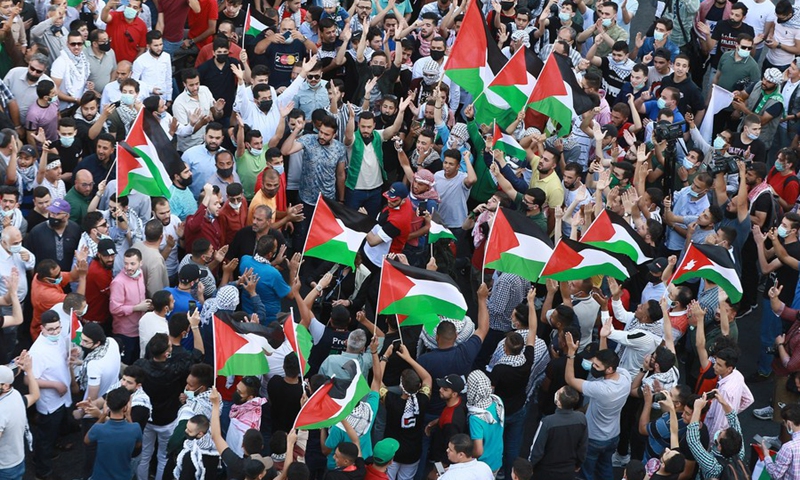 Jordanians hold an anti-Israeli protest to express solidarity with the Palestinian people, in downtown Amman, Jordan, on May 16, 2021.(Photo: Xinhua)